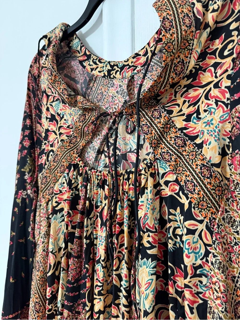 Free People Black Floral Mixed-Print Tunic with Teal and Mustard Accents